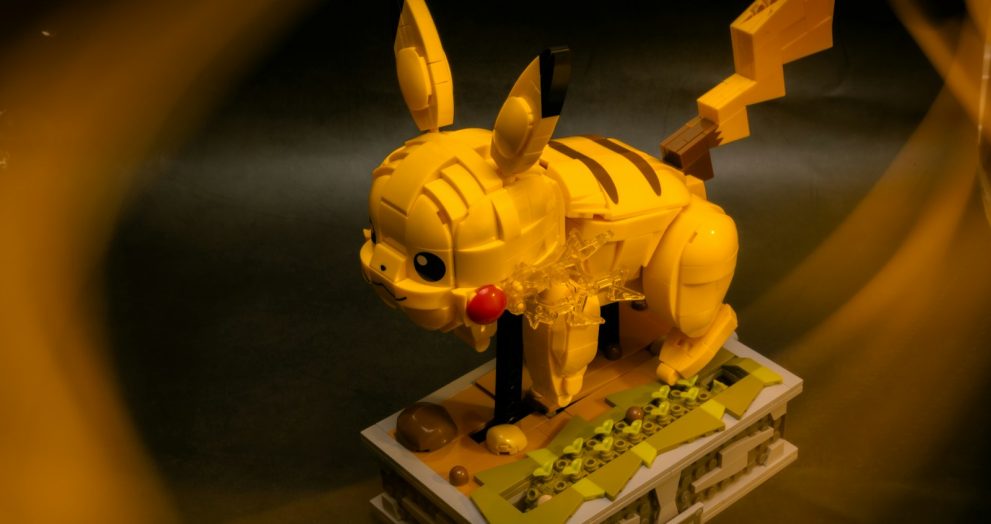 a yellow toy dog on top of a table